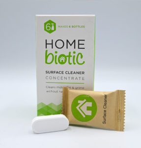 Home biotic surface cleaner concentrate shown with tablet packet